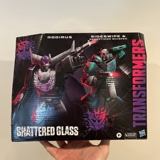Transformers Shattered Glass RODIMUS  SIDESWIPE Deception Whisper  new & sealed