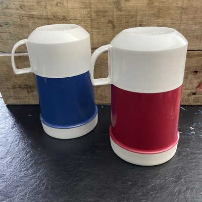 A lot of two plastic thermos brand thermos One Red One And One Blue One.16OZ