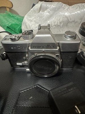 Minolta Srt 101 35 Mm Film Camera Kit With 28 To 70 Mm Lens Case And Accessories
