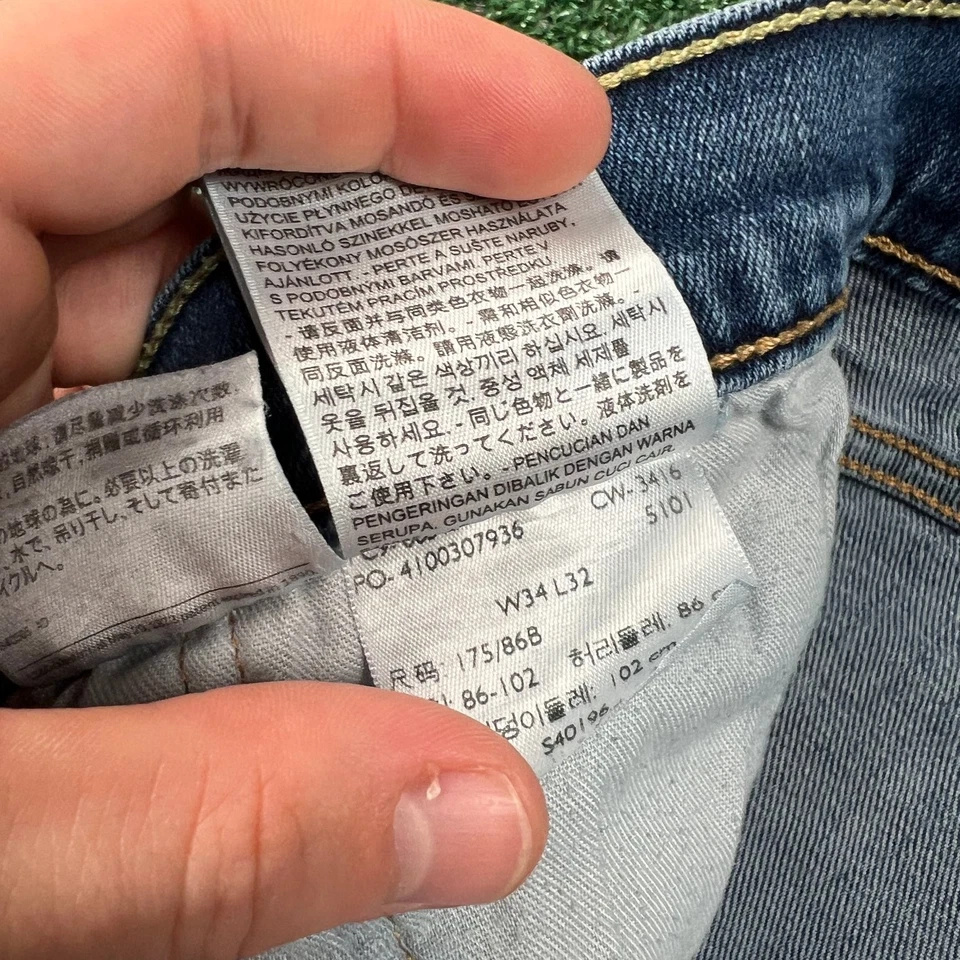 Jeans Levi's 513 ajustados rectos con cremallera lengüeta roja para hombre 33x30" azul lavado medio Foto 4 de 4