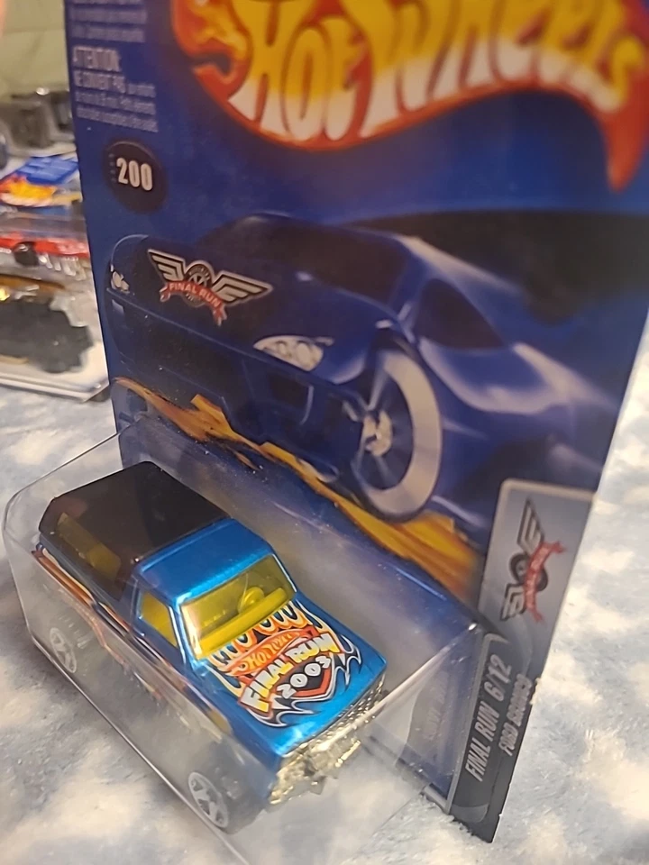Hot Wheels Ford Bronco 2003 Collector #200 Final Run 6/12 azul/amarillo llamas Foto 2 de 3