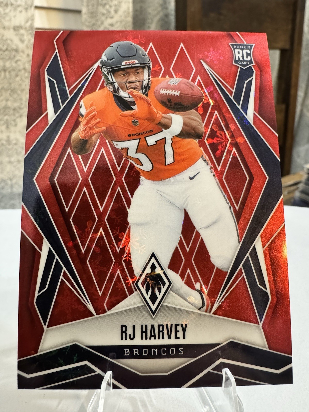 2025 Panini Phoenix - Rookies RJ Harvey #176 Red Winter /399 (RC)