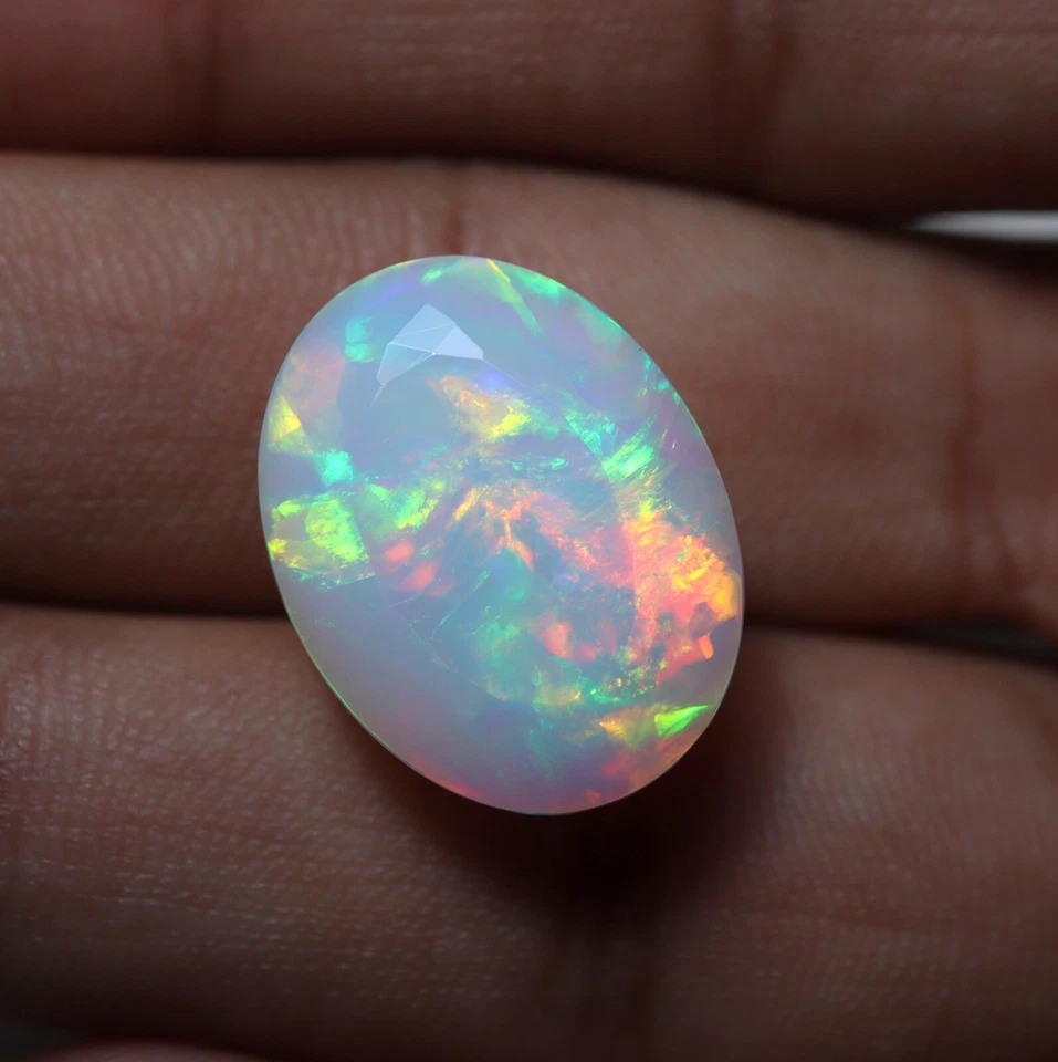15 Cts 20.3x15.7x10.2 MM Real AAA Green Red Yellow Fire Ethiopian Opal Oval Cut - Image 2 of 4
