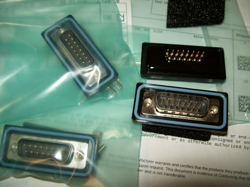 Four SDB-15PMMP-SL8001 15-pin male D-sub connectors with solder terminals