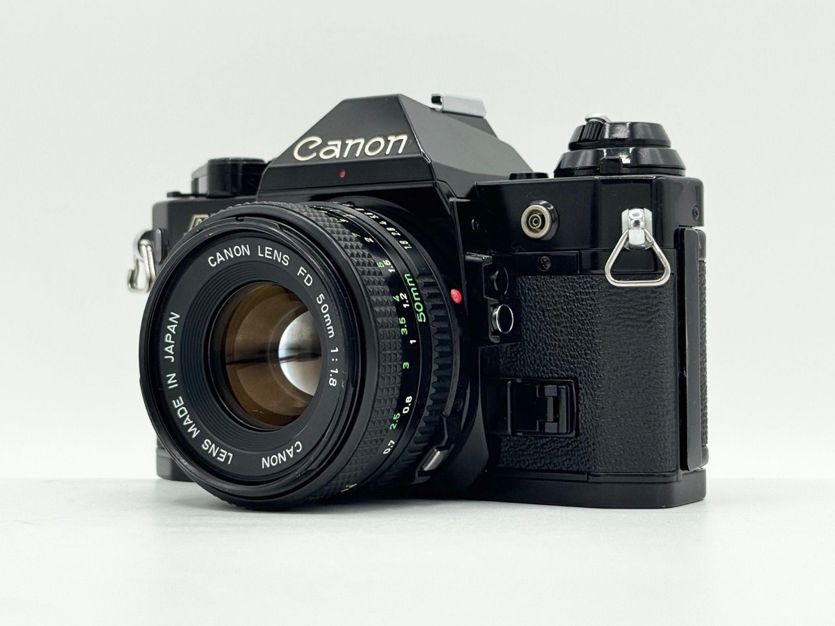 Exc+5* Canon AE-1 Program Black Film Camera w/ NFD 50mm F1.8 Lens