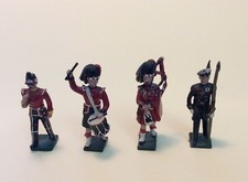 Toy Soldiers -  4 SOLDATINI IN METALLO - EPOCHE DIVERSE - metallo, dipinti mano