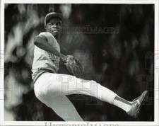 1983 Press Photo Otis Green of Miami Dade North prepares to throw baseball