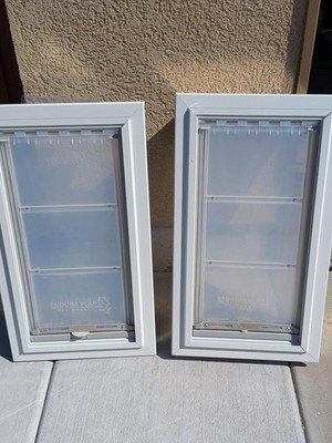 ENDURA FLAP DOG DOOR. Install dimensions are 14'' W x 25 '' H For Small to Medium