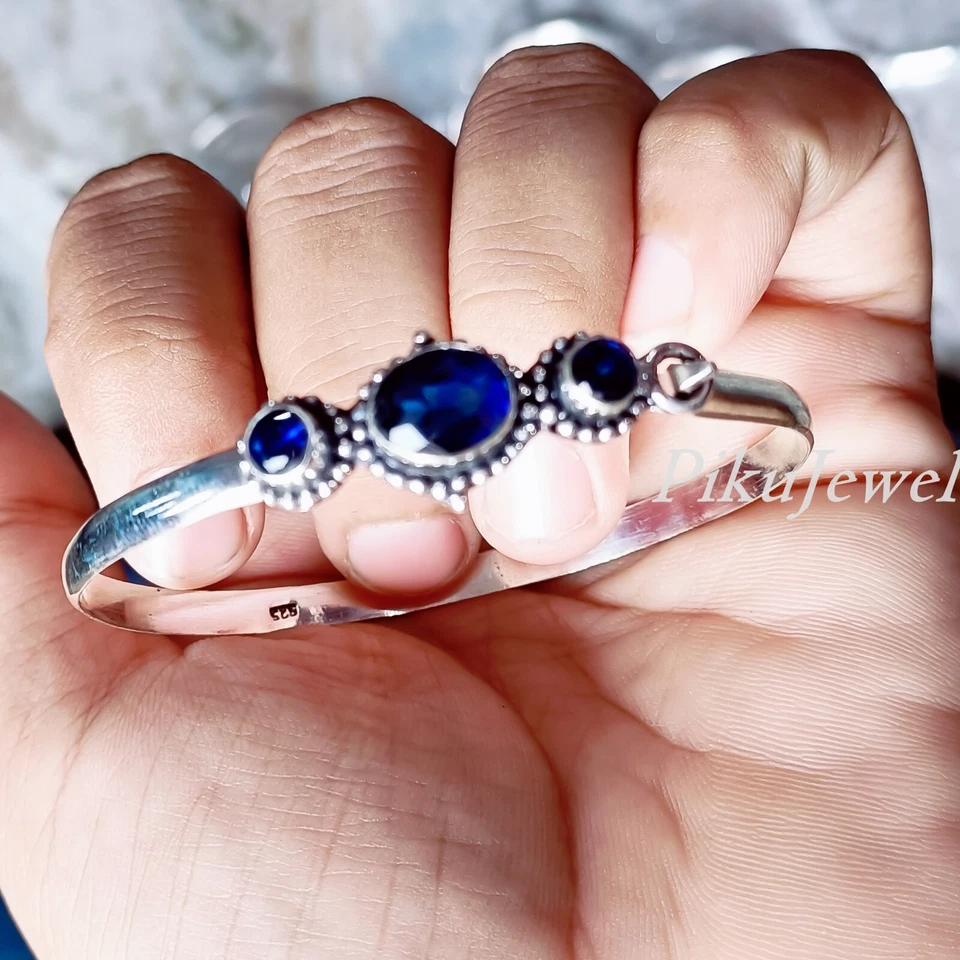 Brazalete brazalete grande de plata de ley 925 con piedras preciosas de talla múltiple de tanzanita azul Foto 4 de 4