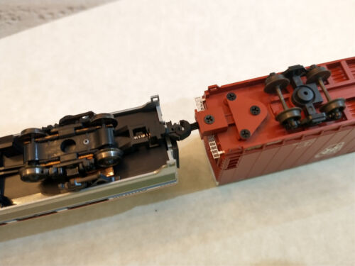 34 N Scale Train Couplers - 30 Hingeless Couplers and 4 Rapido-Style Couplers - Picture 6 of 9