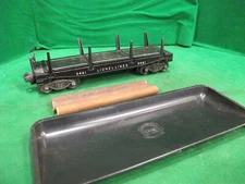POSTWAR LIONEL 3461  LOG DUMP CAR, LOGS & NO. 160 BIN,  WORKS FINE.