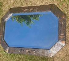 Attractive Arts & Crafts wall-mounted copper-framed bevelled wall mirror