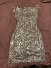 Dress size 7. Dress has never been worn and it will show off your figure!