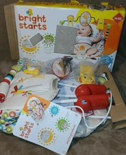 bright starts playful pinwheels bouncer