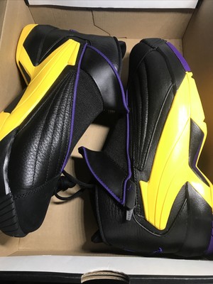 purple jordans gold jumpman