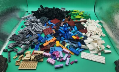 Nice assortment of Lego Blocks with unique set pieces. 1 1b 14 oz bundle bag lot
