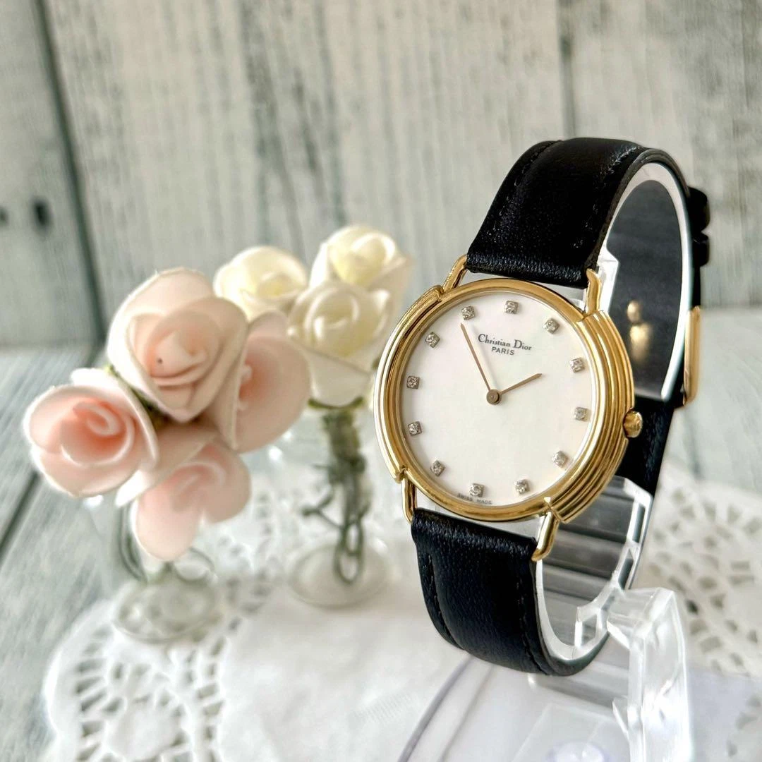 Montre Christian Dior blanche et noire fonctionne du Japon