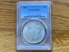 1883 MORGAN SILVER DOLLAR GRADED BY PCGS MS-63.