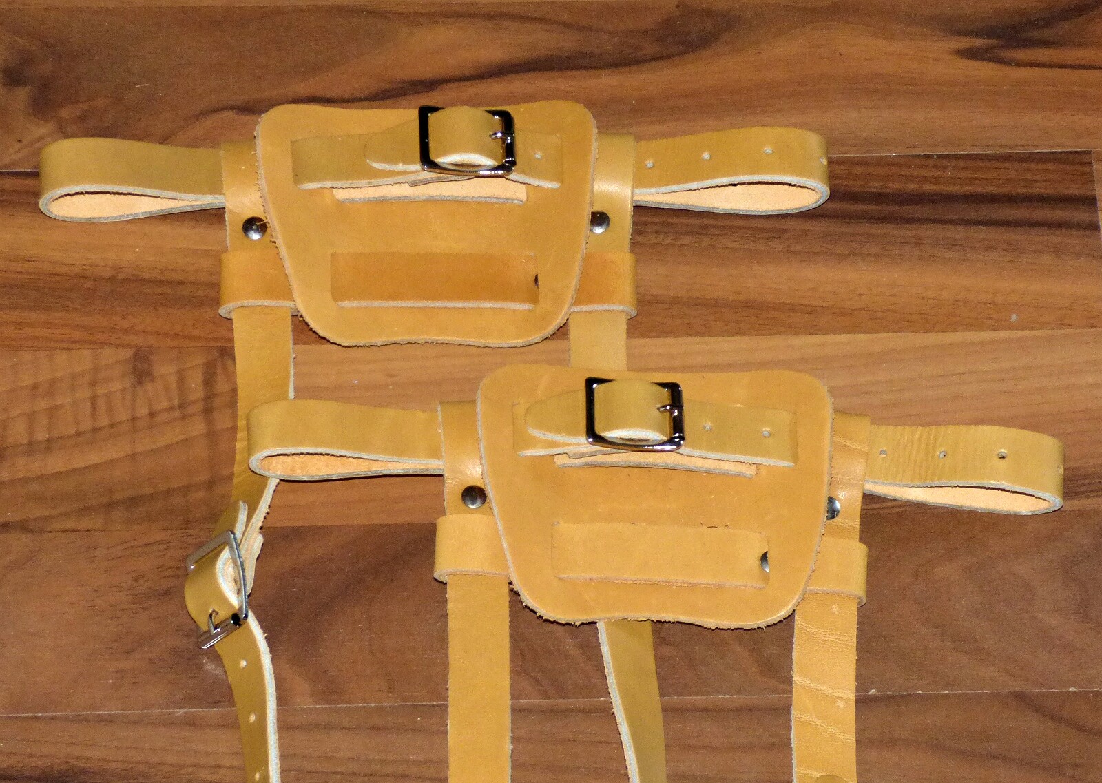 Brand new pair of tan colored leather bindings for snowshoes