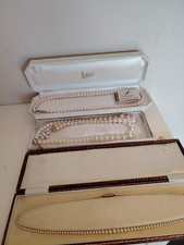 3 Sets Of Pearls Including A Set Of Lotus Simulated Pearls, Original Boxes.