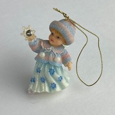Christmas Ornament Child Holding A Crystal In Hand Hat Dress Collectible