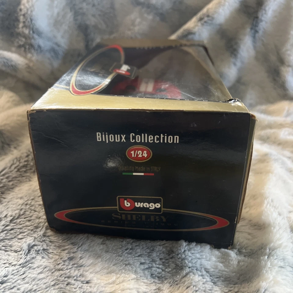 Nuevo en caja Bburago Bijoux Collection 1:24 Die Cast 1999 Shelby Serie 1 Roadster Foto 4 de 4