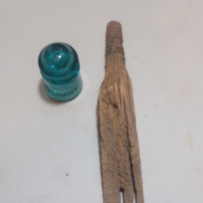 Hemingray No. 9 Aqua Blue Glass Insulator with Wooden Peg and Wooden Pin