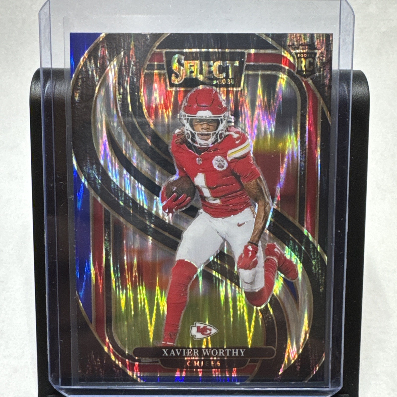 2024 Panini Select #119 Xavier Worthy RC Black & Blue Prizm Shock RC