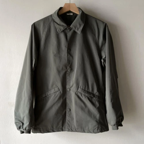 Giacca Coach Uniqlo U grigia taglia S design doppio strato polsini tubati