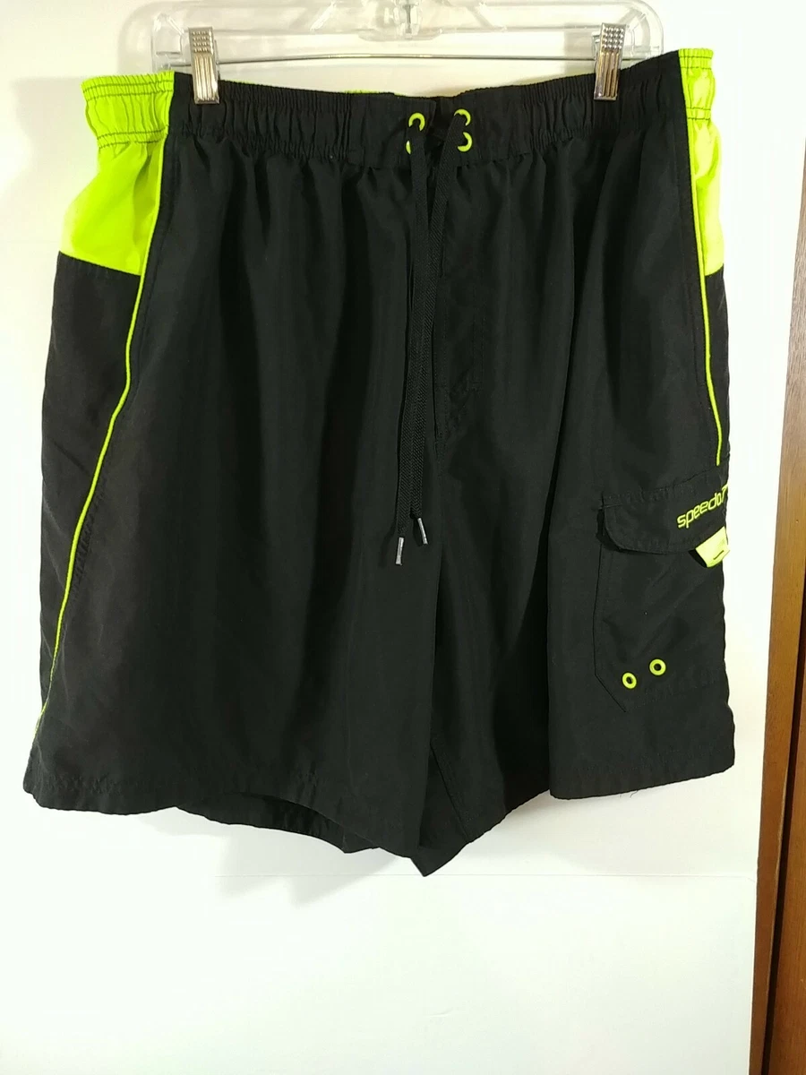 Black and green store swim trunks