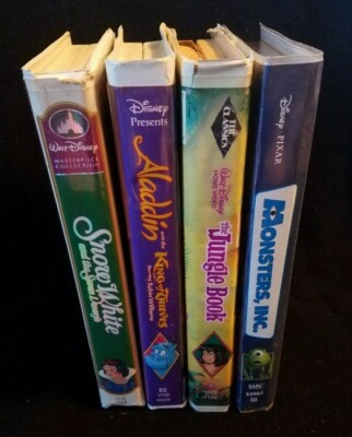 4 DISNEY VHS Tapes Monster Inc Jungle Book Snow White Aladdin