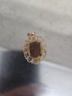 Vintage goldstone, set in an ornate gold-tone filigree frame. — photo 2