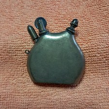 Accendino antico dell'azienda svizzera Thorens in ottone, a benzina