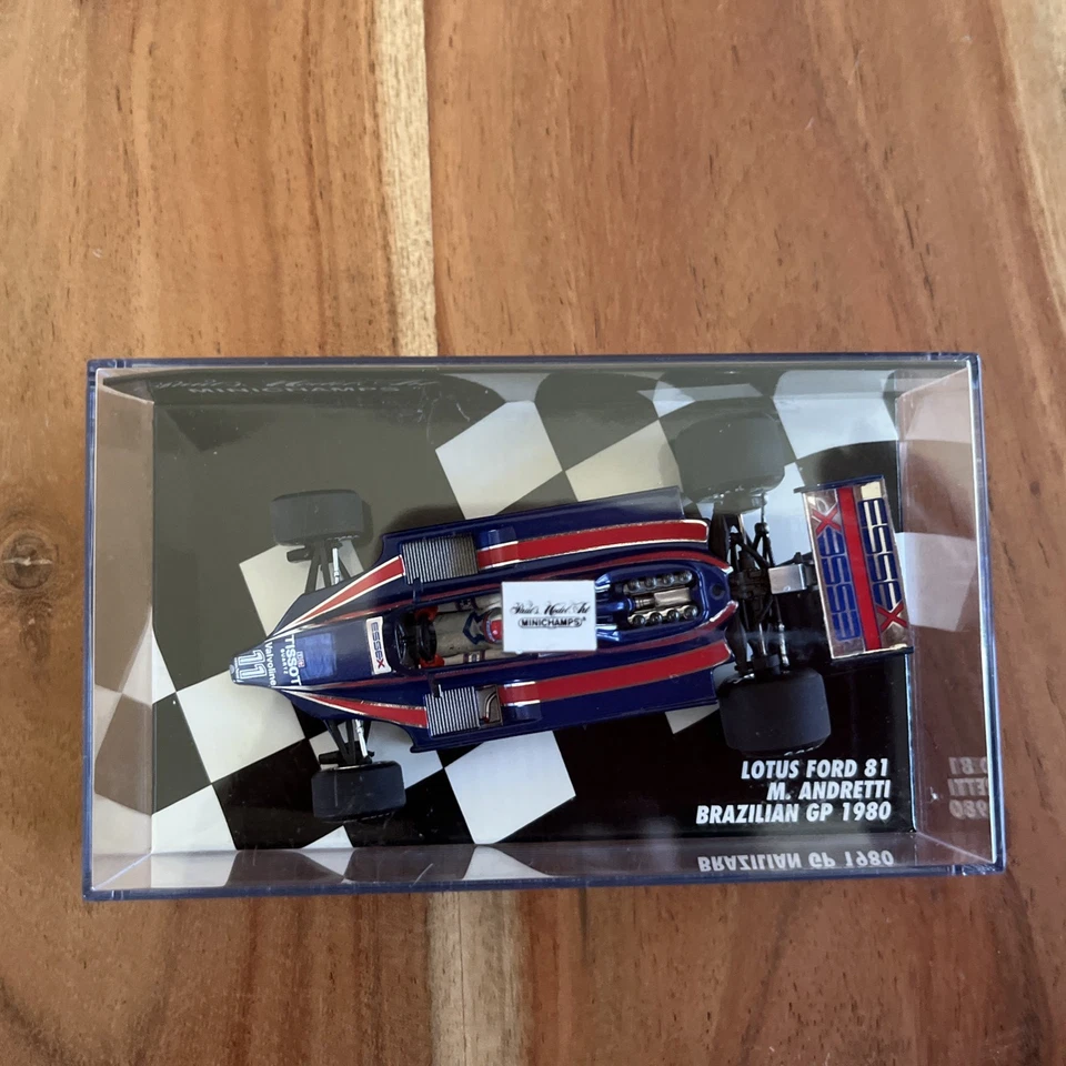 MiniChamps: Lotus Ford 81 No11 Mario Andretti Brazillian GP 1980 1:43 - Изображение 2 из 4