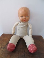 Antique doll. Bisque head and cloth body handpainted face 15 inches tall 38cm