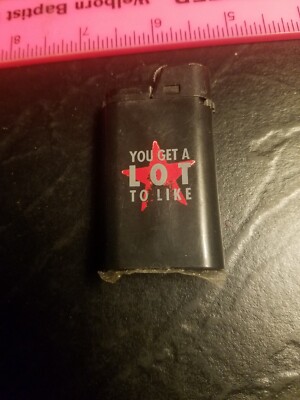 NOVELTY'' YOU GET A LOT TO LIKE'' REFILLABLE LIGHTER