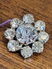 Beau bouton en pâte bling strass