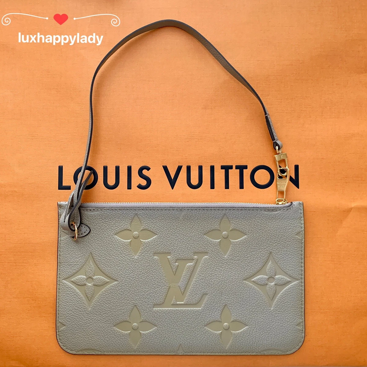 Louis vuitton deals pouch wristlet