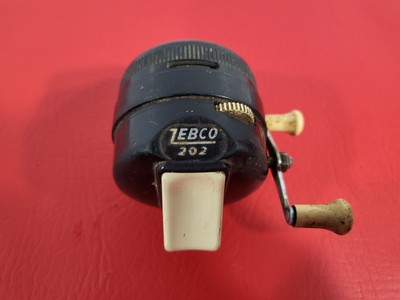 Moulinet de pêche vintage Zebco 202, noir et argent, fabriqué Moulinet de pêche vintage Zebco 202, noir et argent, fabriqué