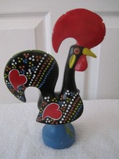 Rooster Black and red with blue base 25.51