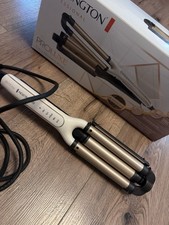 Remington PROLUXE 4-in-1 Adjustable Waver Wel...