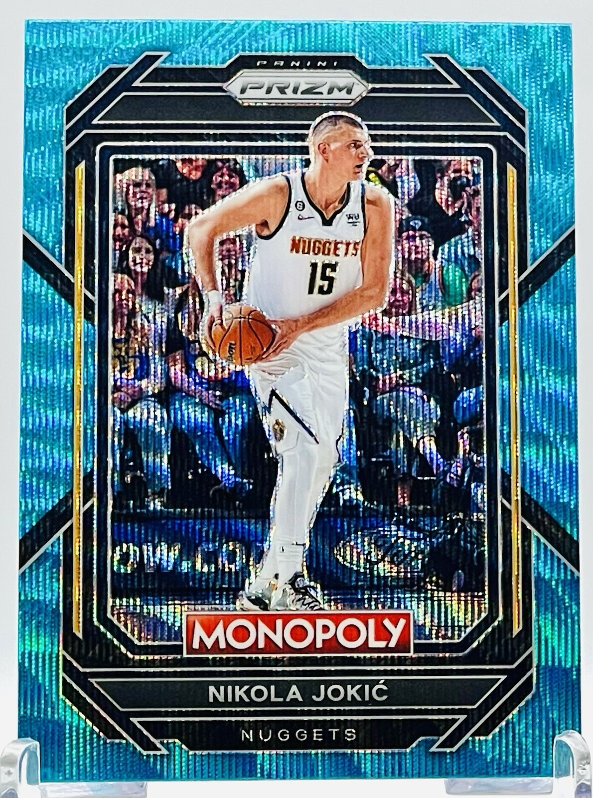 2022-23 Panini Prizm #22 Nikola Jokic Monopoly Teal Wave Prizm SP Nuggets
