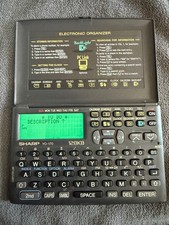 Sharp YO-170 Electronic Organizer 128KB Backlit PC-Link Pocket PDA - Retro. Work