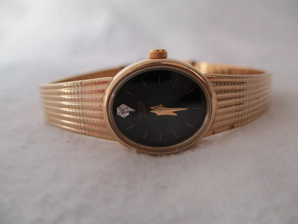Gold citizen clearance watch black face