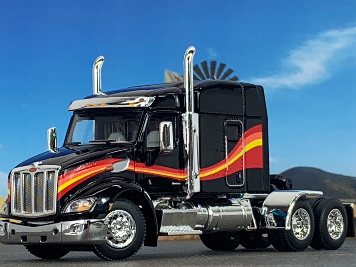 1/64 DCP BLACK/RED/YELLOW PETERBILT 579 W/ 72