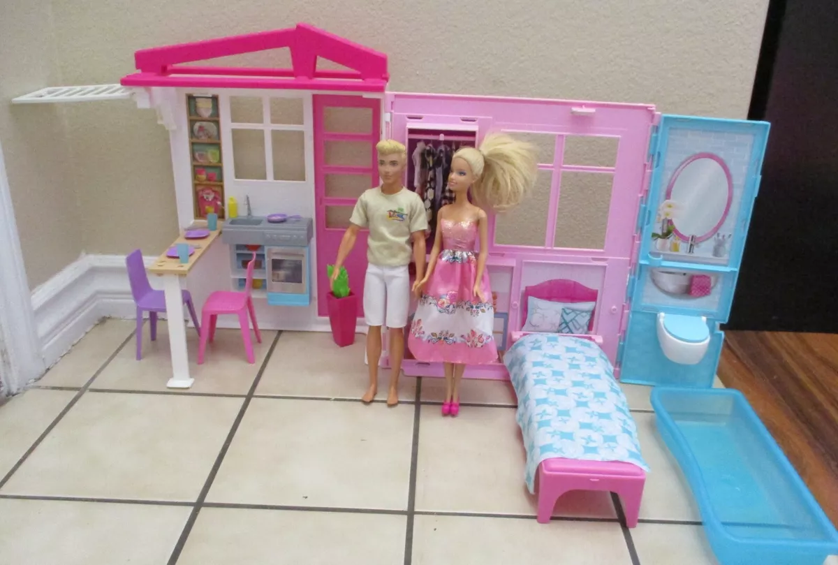 Barbie fold best sale up house