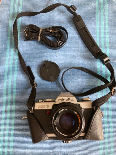 Vintage Minolta XG7 SLR Camera with Accessories