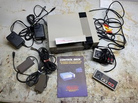 Nintendo Bundle UNTESTED NES Games Power Pad Zapper Light Gun Four Score