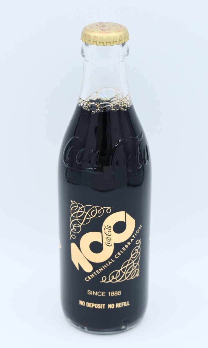 1986 Japanese GOLD acl print 100th Anniversary Coca Cola Bottle