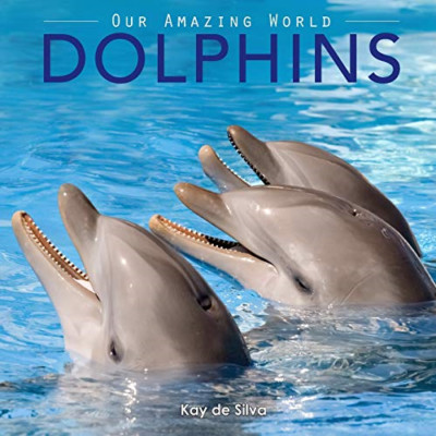 Dolphins: Amazing Pictures & Fun Facts on Animals in Na - Paperback / softback N
